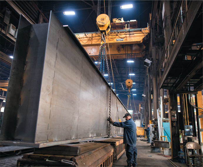 a 40t double girder 120 foot span crane moving through our production facility